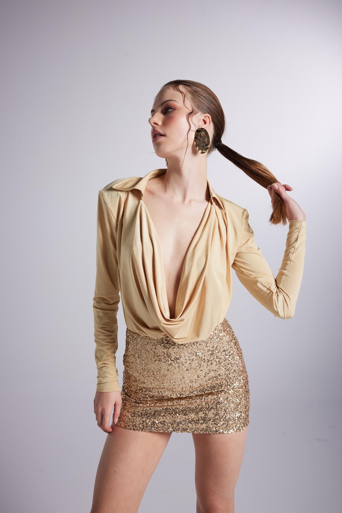 Image of Degaje Yaka Dekolteli Çıtçıtlı Taylor Bodysuit Gold