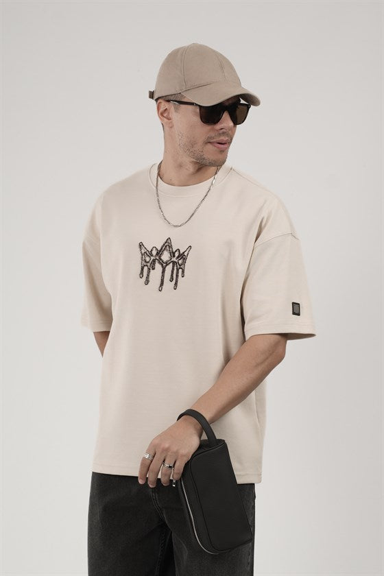 Image of Tricou bărbătesc supradimensionat cu guler rotund și logo cu strasuri