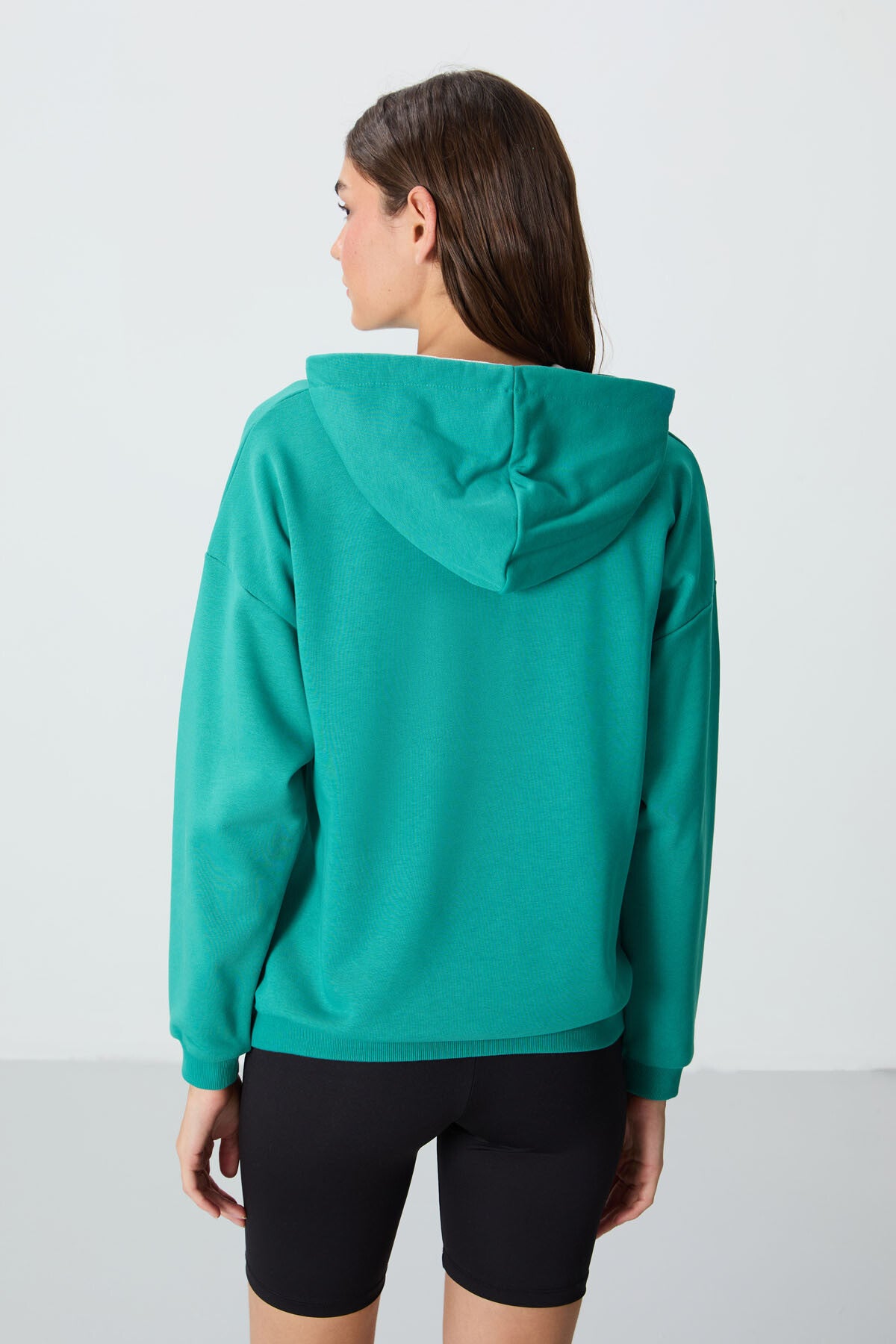 Image of Deniz Yeşili Kompakt Pamuklu Kalın Pürüzsüz Dokulu Kapüşonlu Oversize Fit Kadın Sweatshirt - 97291