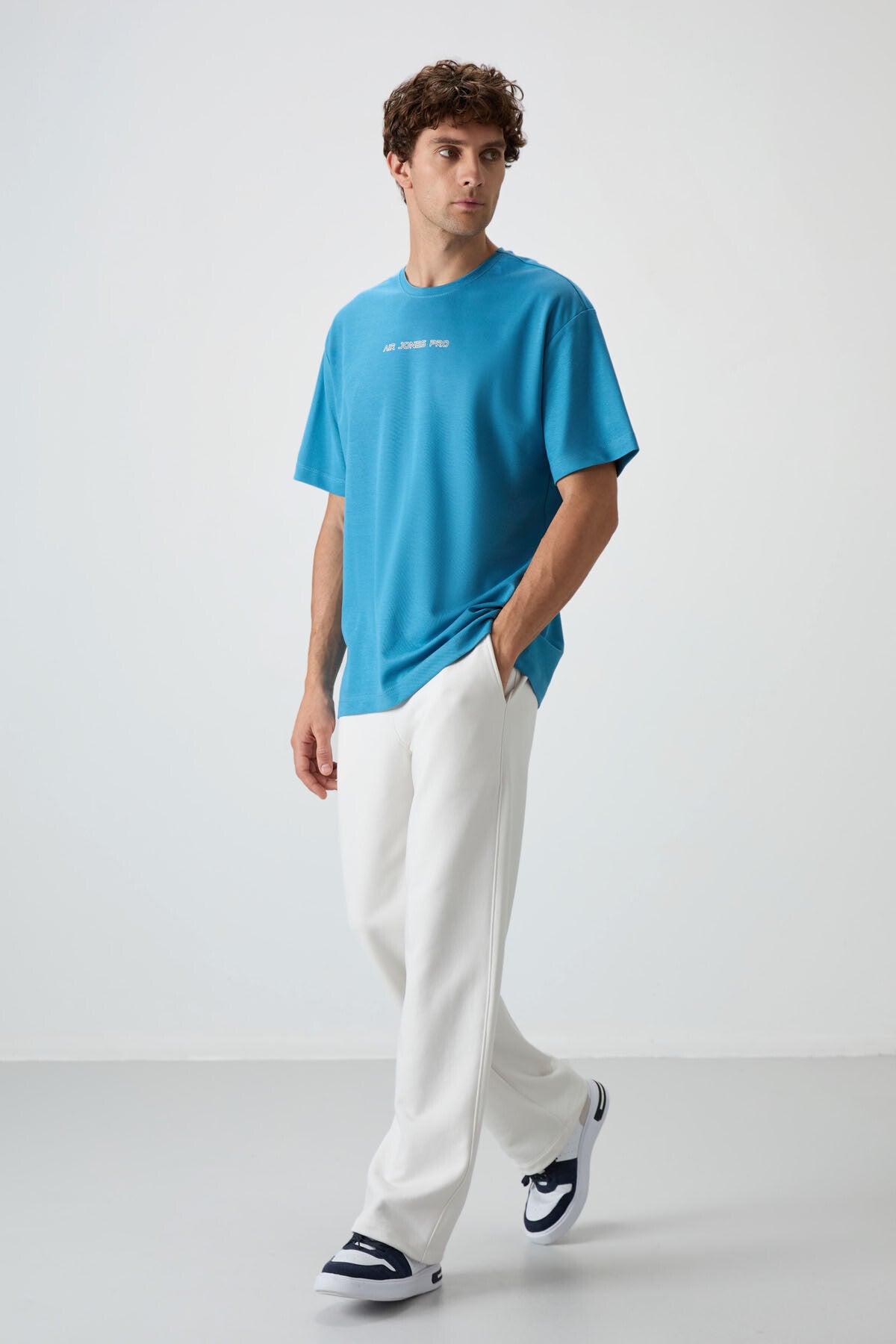 Image of Petrol Mavi Pamuklu Kalın Yüzeyi Dokulu Oversize Fit  Baskılı Erkek T-Shirt - 88364