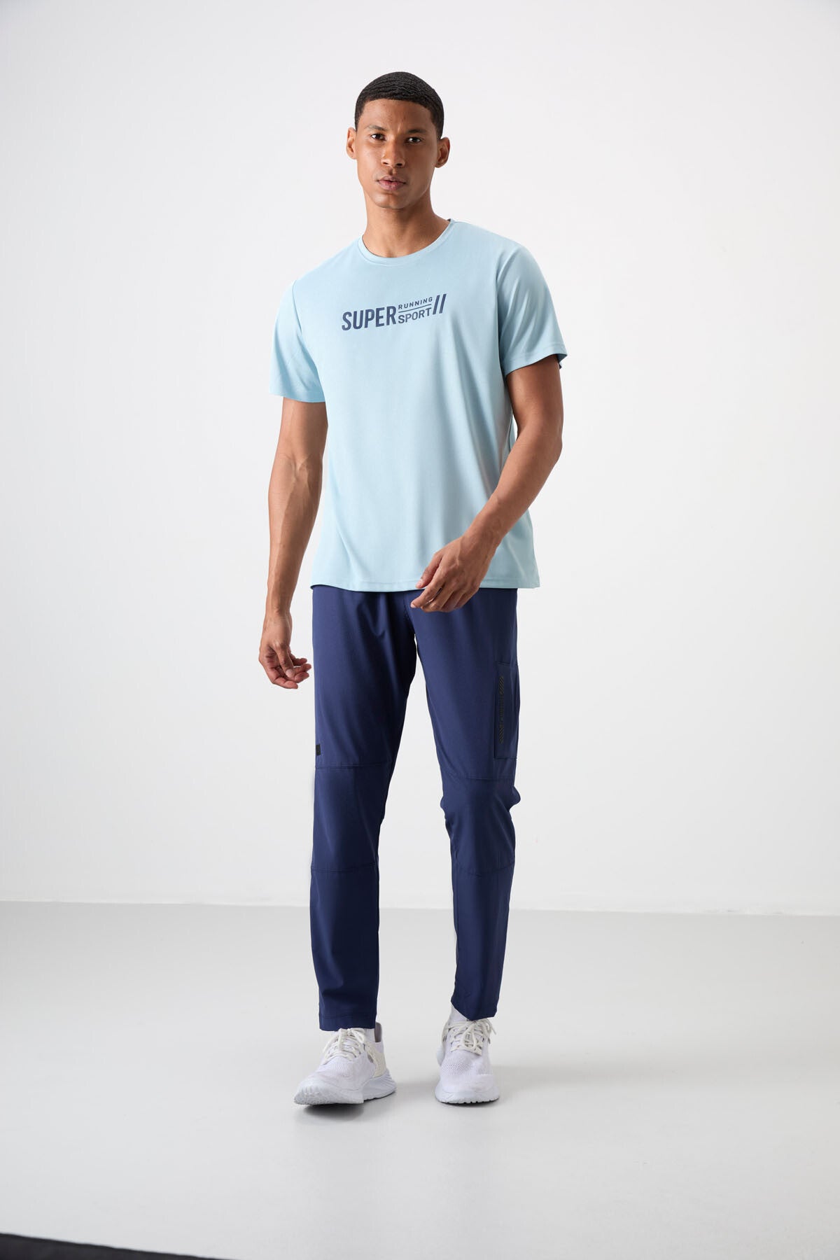 Image of Açık Mavi Nefes Alan Dokulu İnce Esnek Standart Fit Erkek Performans T-Shirt - 88385