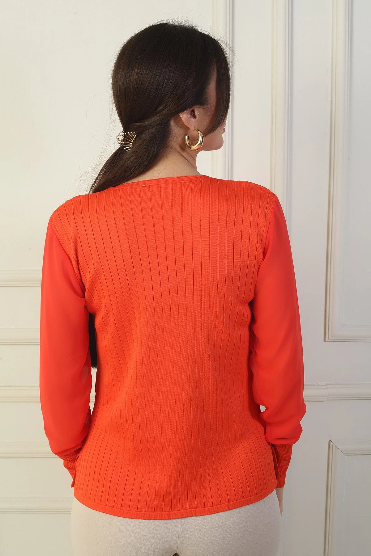 Image of Women's Sleeveless Chiffon V-Neck Sweater