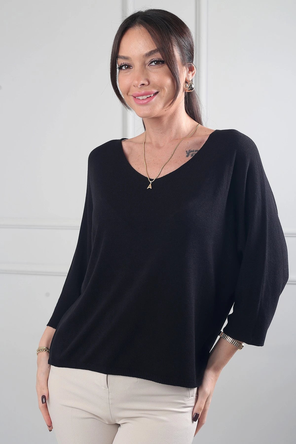 Image of Women's V-Neck Batwing Sleeve Knitted Blouse