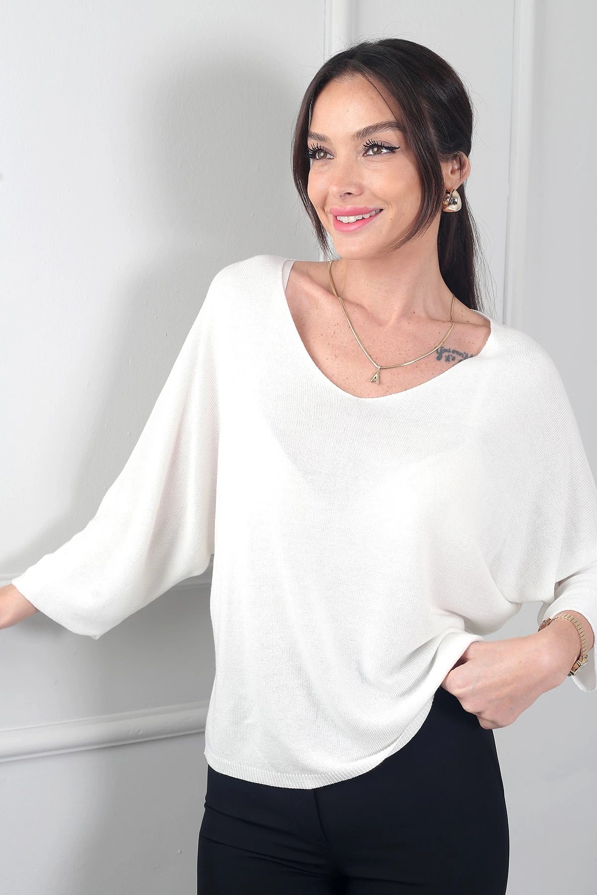 Image of Women's V-Neck Batwing Sleeve Knitted Blouse