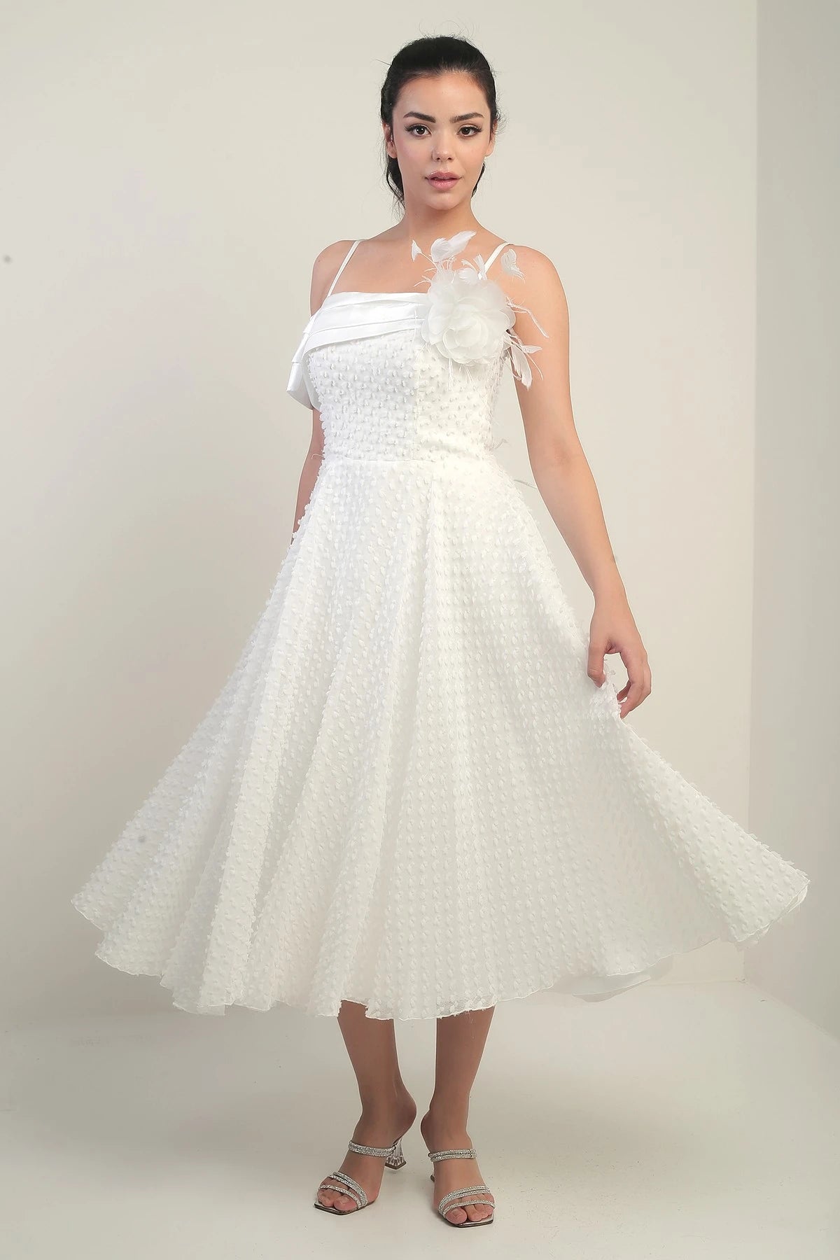 Image of Women's Strappy, Back Lace-Up, Dropped One-Sleeve Dress with Feather Brooch, Lined, and Glossy Fabric.