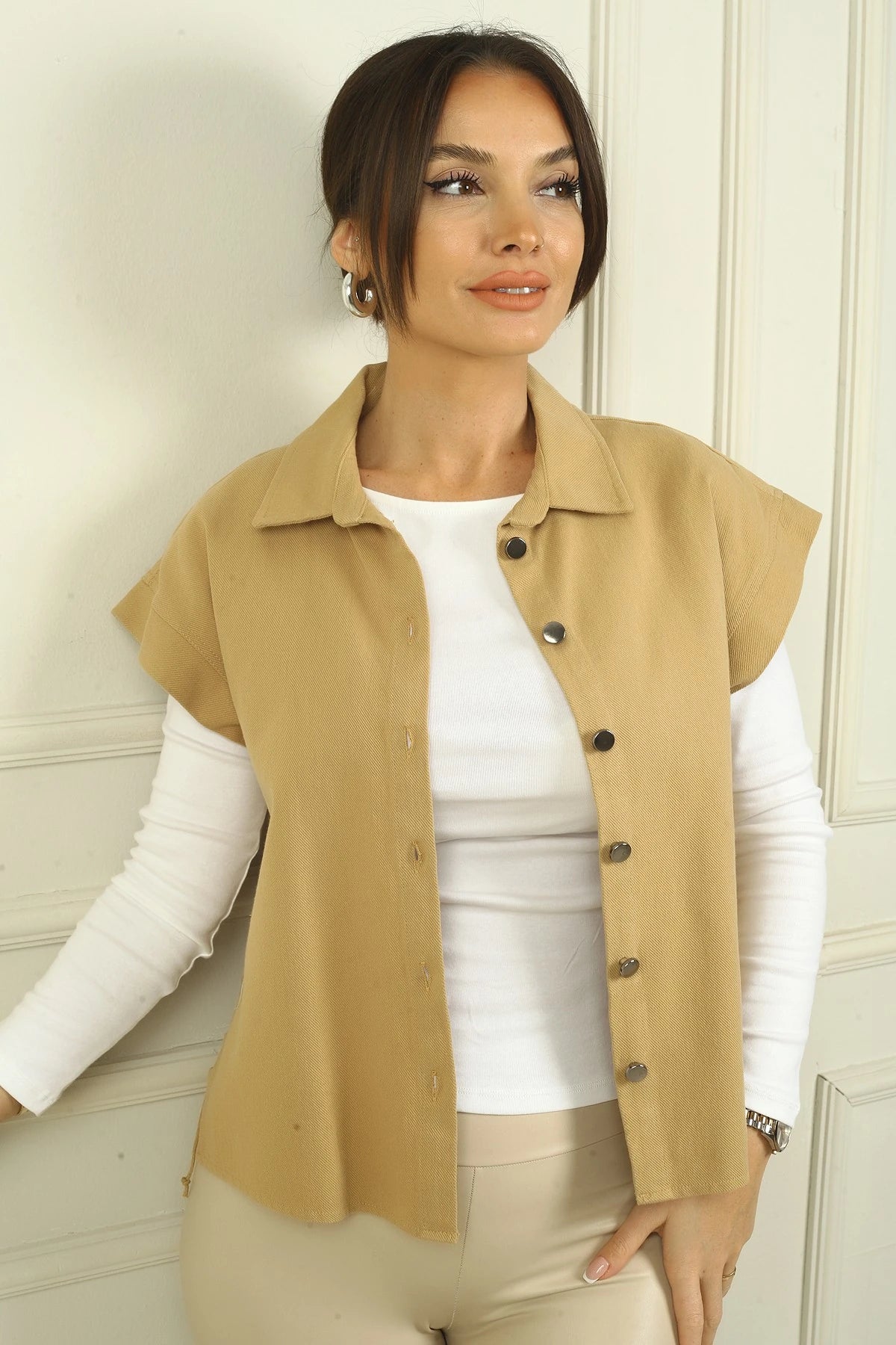 Image of Women's Dropped Sleeve Vest with Side Laces and Metal Buttons at the Front