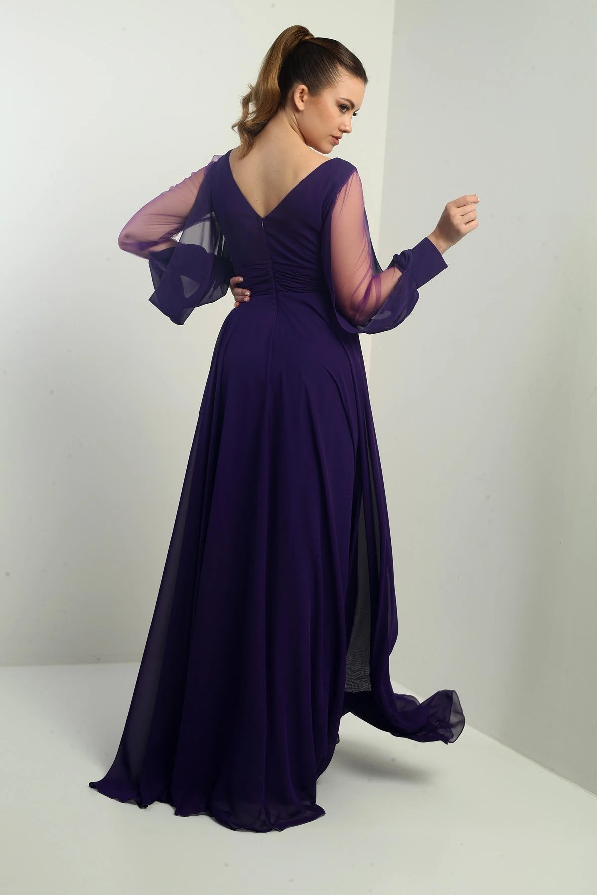 Image of Front and back V-neck, draped front, tulle sleeves, lined, wide-length chiffon dress.