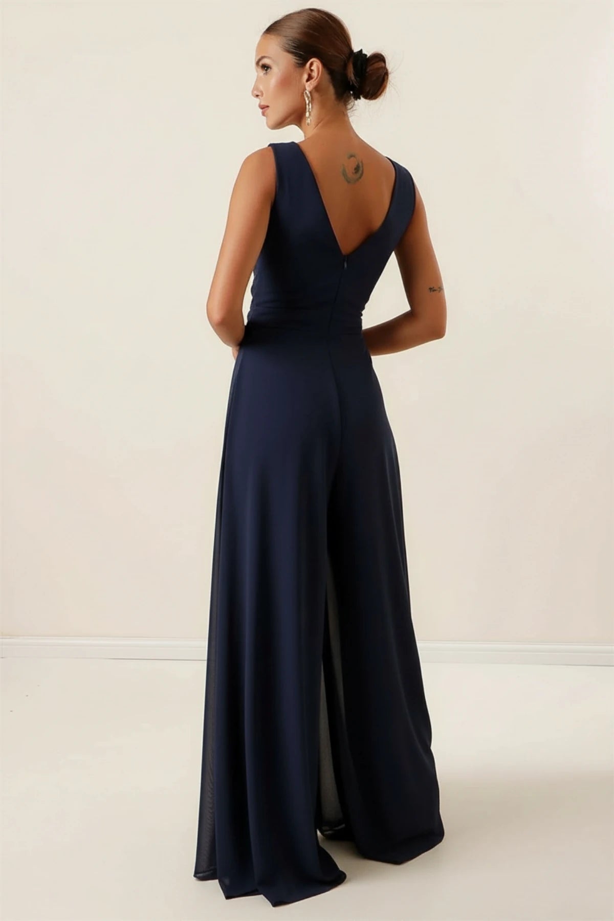 Image of Waist-detailed, front and back V-neck, lined chiffon jumpsuit.
