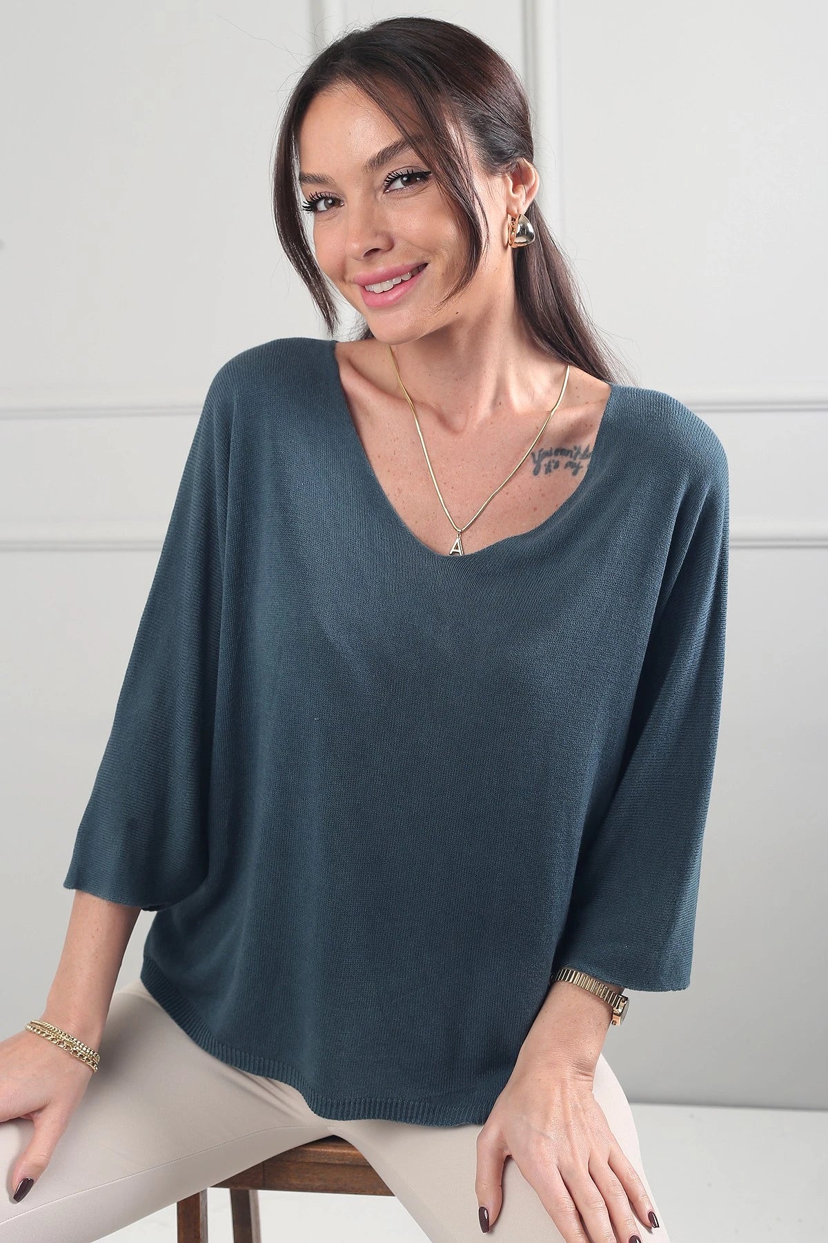 Image of Women's V-Neck Batwing Sleeve Knitted Blouse