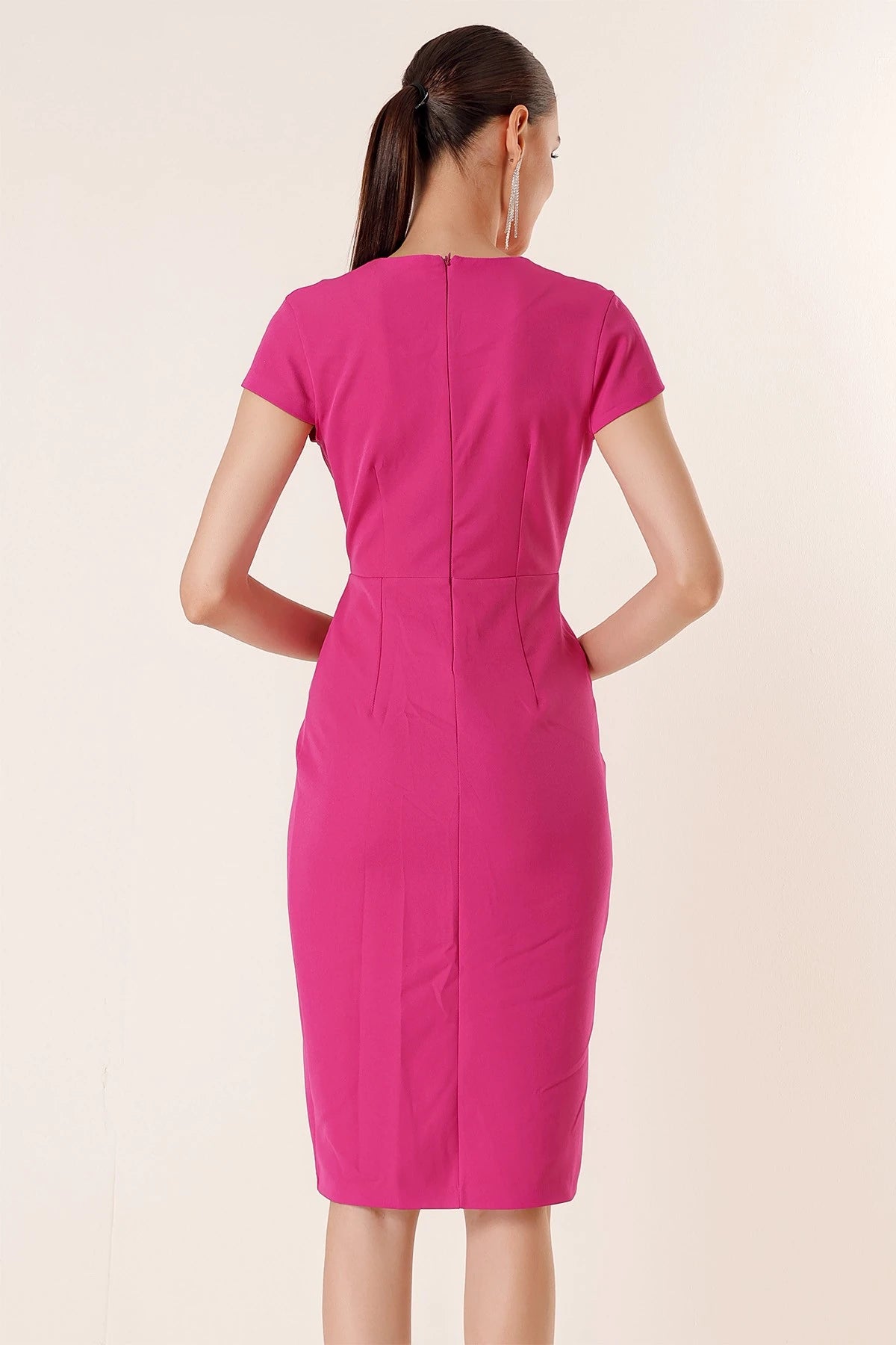 Image of Wrap-neck, half-moon sleeve dress with stone details and front slit.