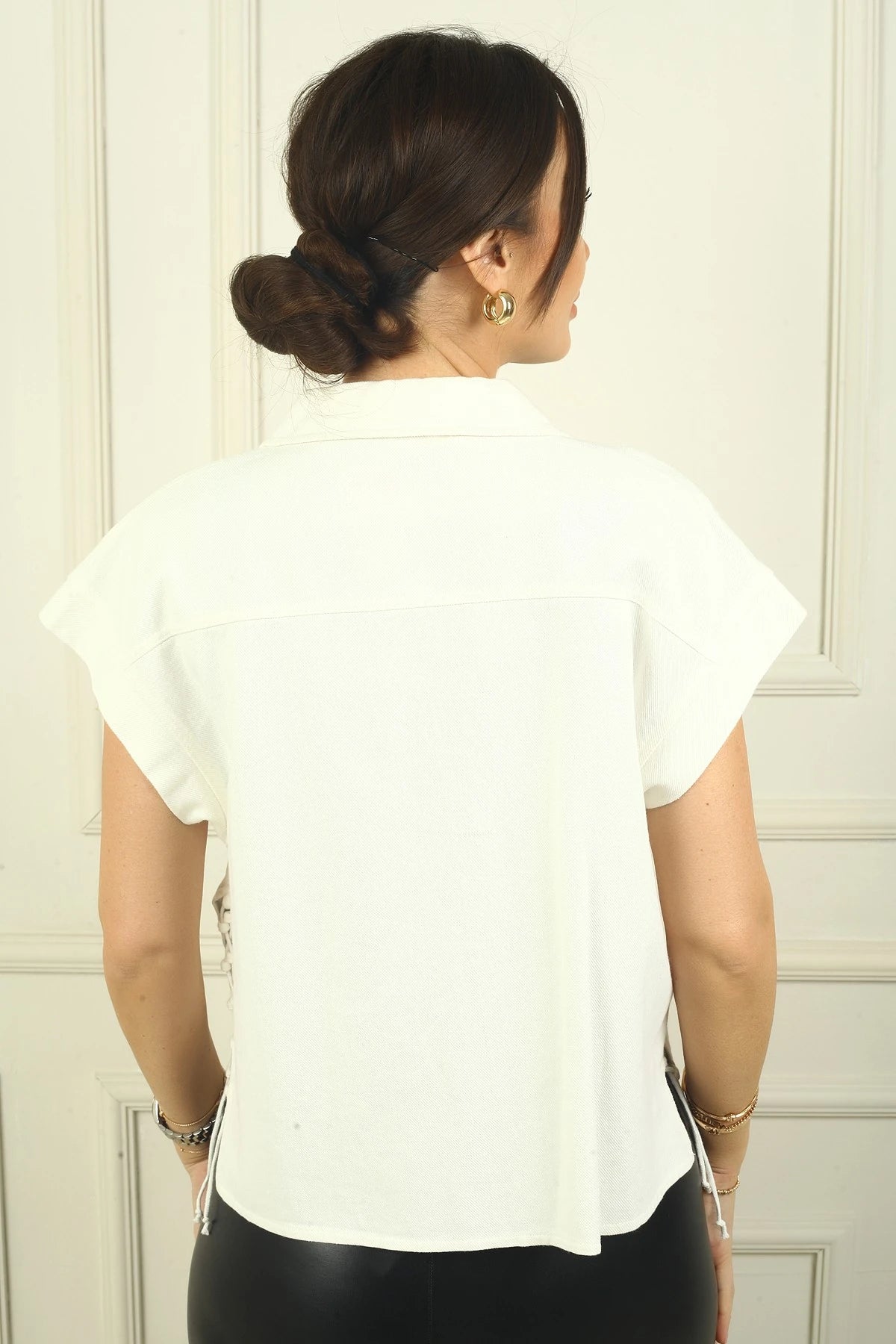 Image of Women's Dropped Sleeve Vest with Side Laces and Metal Buttons at the Front