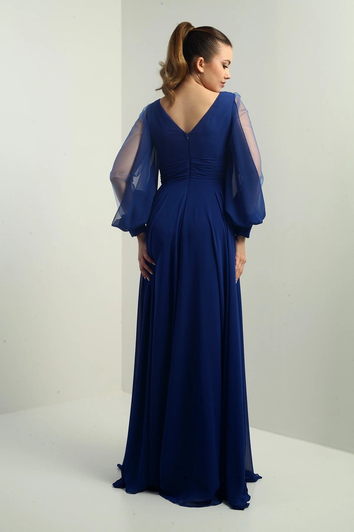 Image of Front and back V-neck, draped front, tulle sleeves, lined, wide-length chiffon dress.