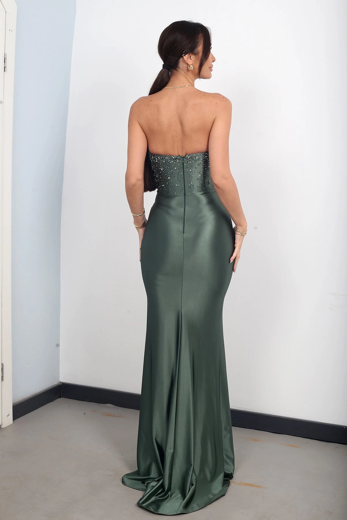 Image of Women's Strapless Batwing Neck Lined Long Satin Dress with Stone Embellishments and Draped Front.