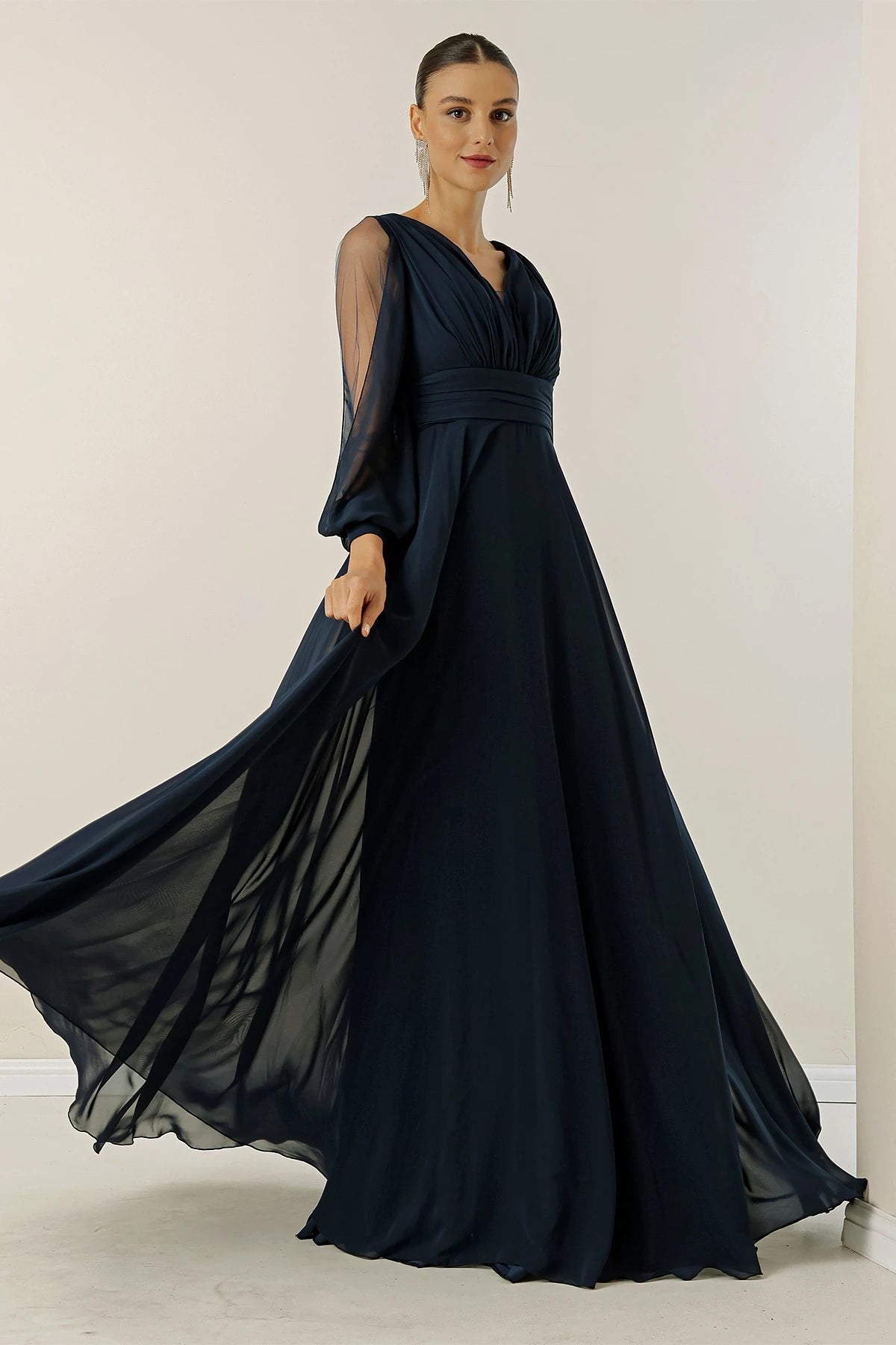 Image of Front and back V-neck, draped front, tulle sleeves, lined, wide-length chiffon dress.