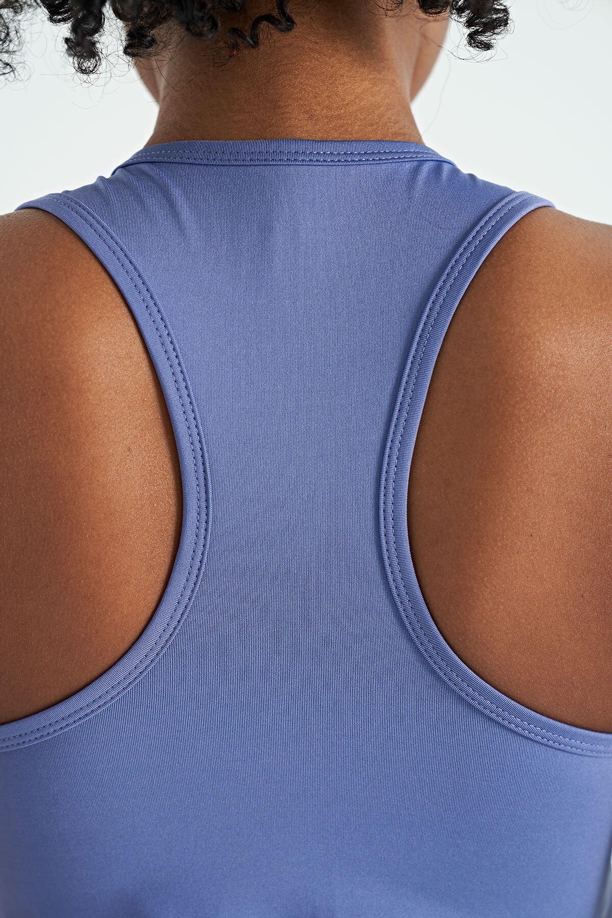 Image of Eflatun Yırtmaç Detaylı O Yaka Sıfır Kollu Standart Kalıp Kadın Spor Atlet - 97256