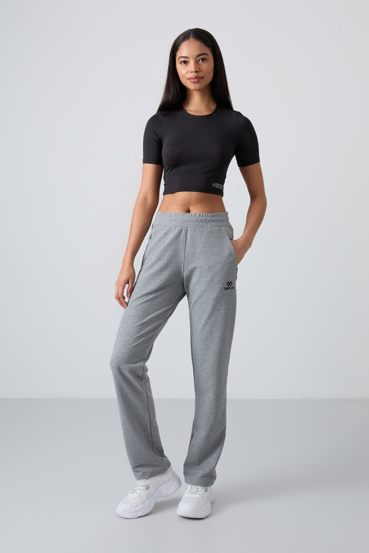 Image of Pantaloni de trening gri melanj pentru femei cu buzunare ascunse cu fermoar, croială confortabilă, model clasic - 94148