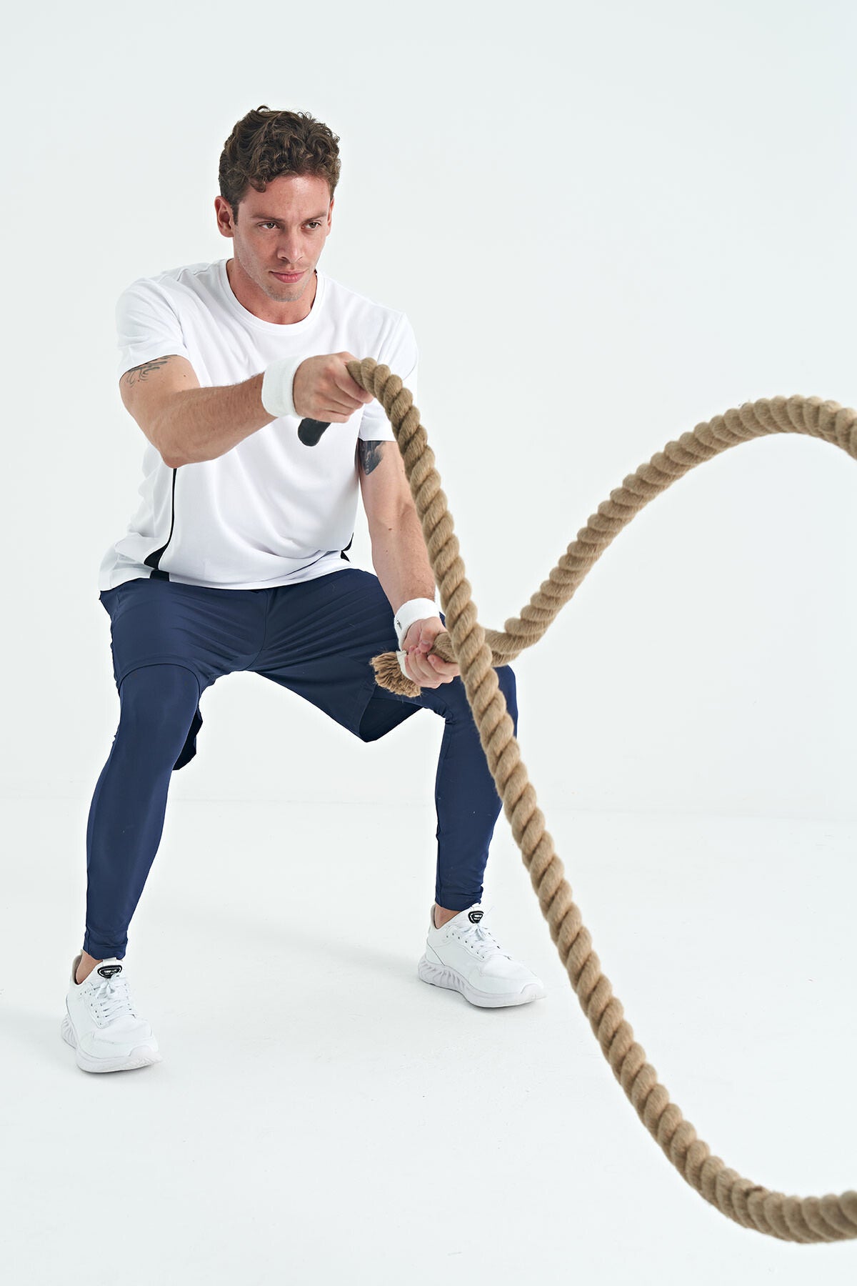 Image of Colanți sport slim fit cu talie înaltă și imprimeu indigo pentru bărbați - 84989