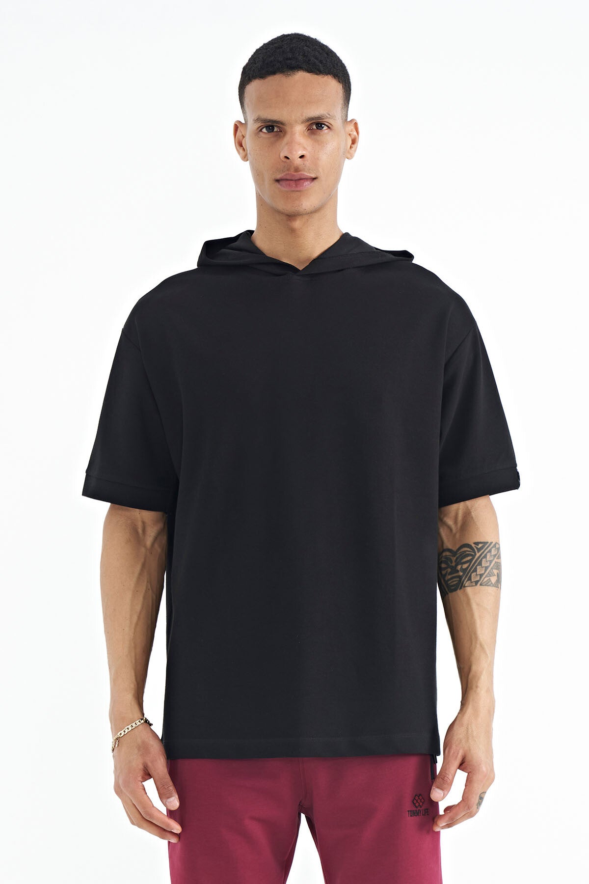 Image of Black Hooded Oversize T-shirt with Sleeve Label Detail for Men - 88179