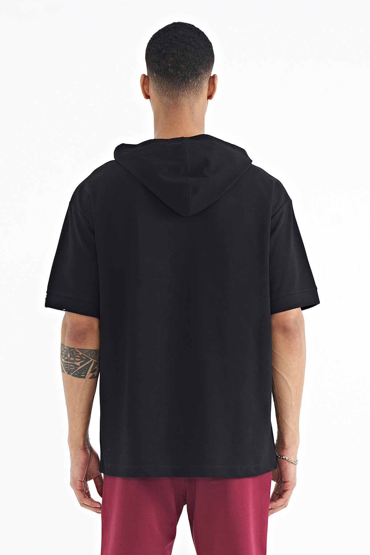 Image of Black Hooded Oversize T-shirt with Sleeve Label Detail for Men - 88179