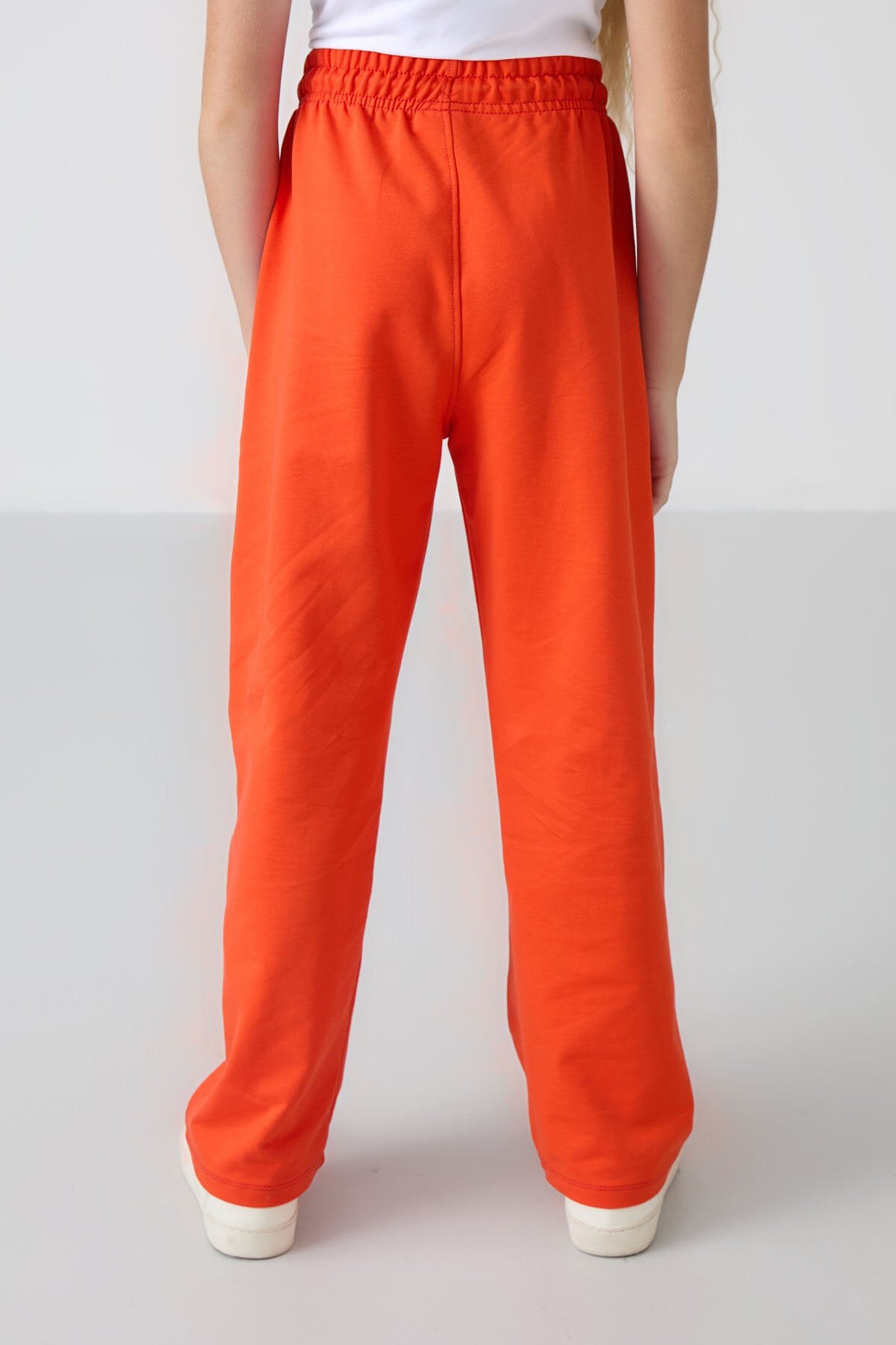 Image of Portakal Cepli Ön Dikiş Detaylı Geniş Paça Kız Çocuk Eşofman Altı -75144