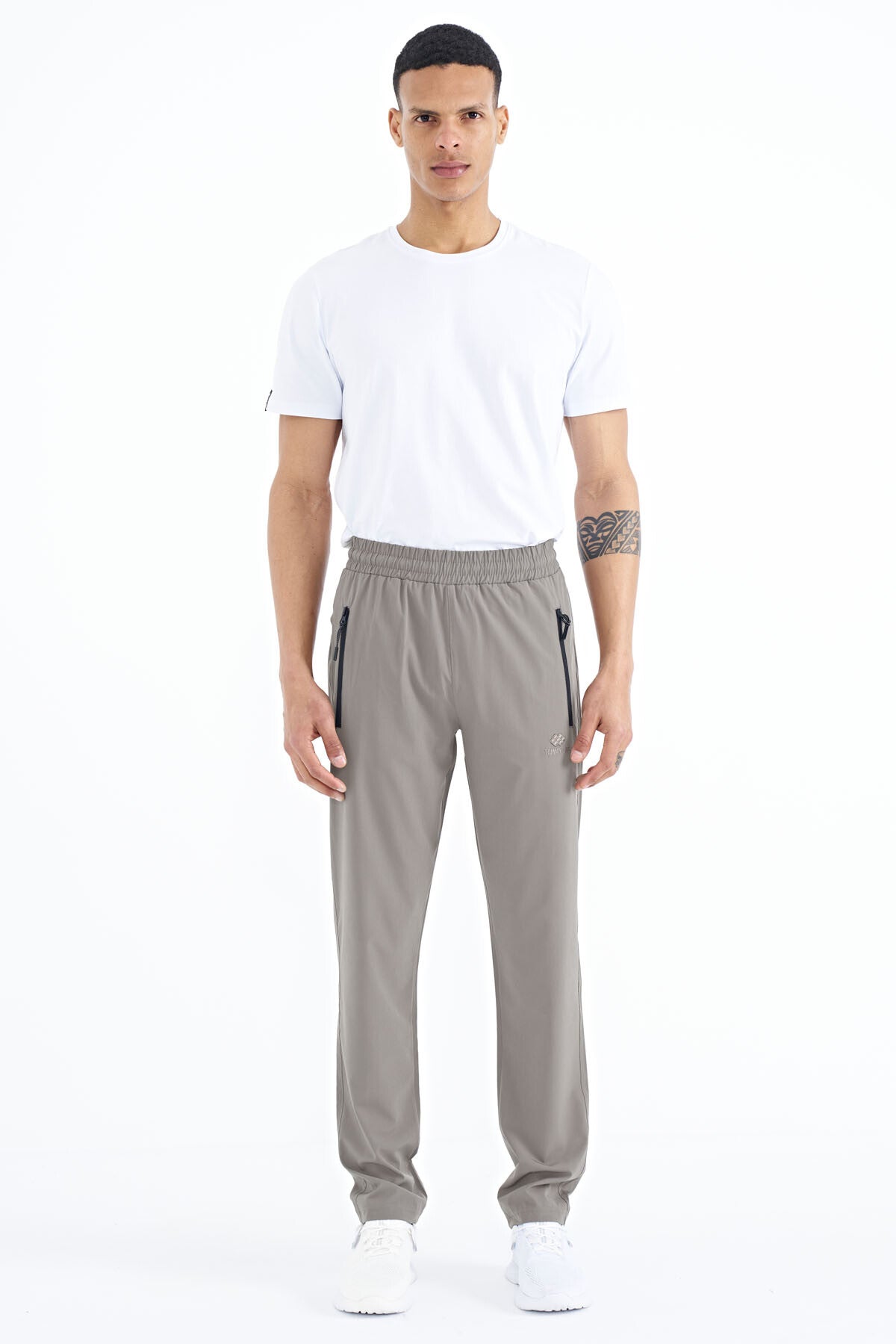 Image of Pantaloni de trening Stone pentru bărbați, cu fermoar, trei buzunare, croială standard, pe picior clasic - 84768