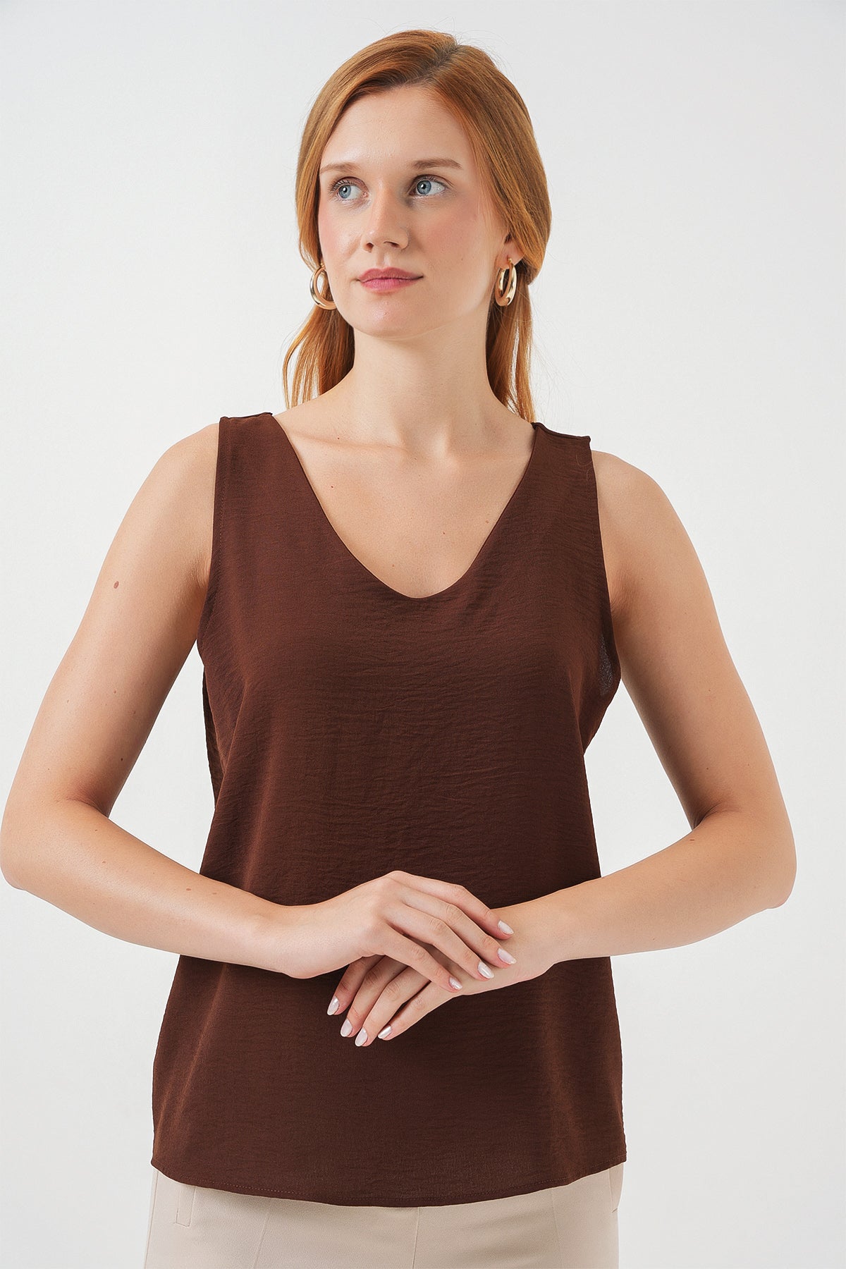 Image of V-Neck Sleeveless Blouse 950 - Brown