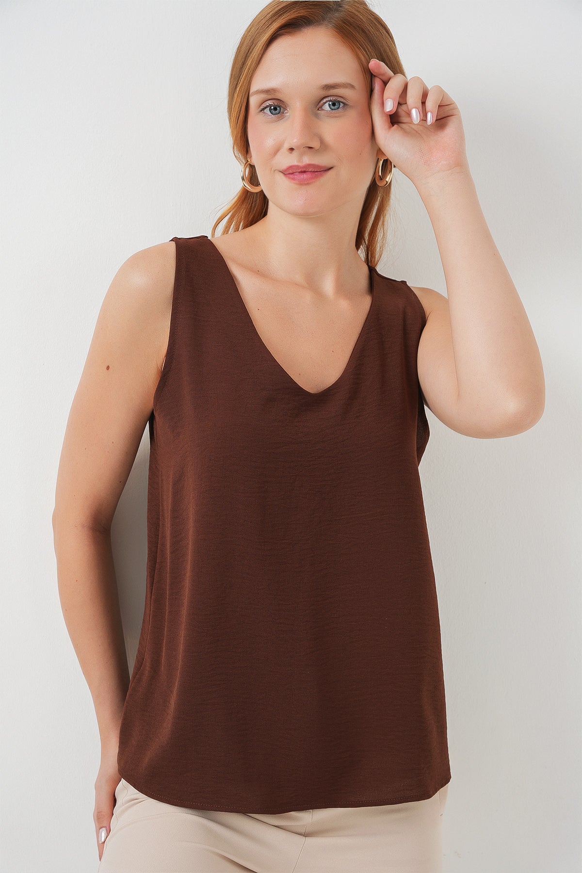 Image of V-Neck Sleeveless Blouse 950 - Brown